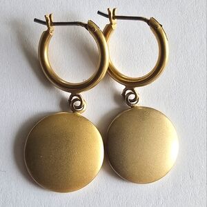 Hoop earrings with dangly circle charms gold tone brushed
